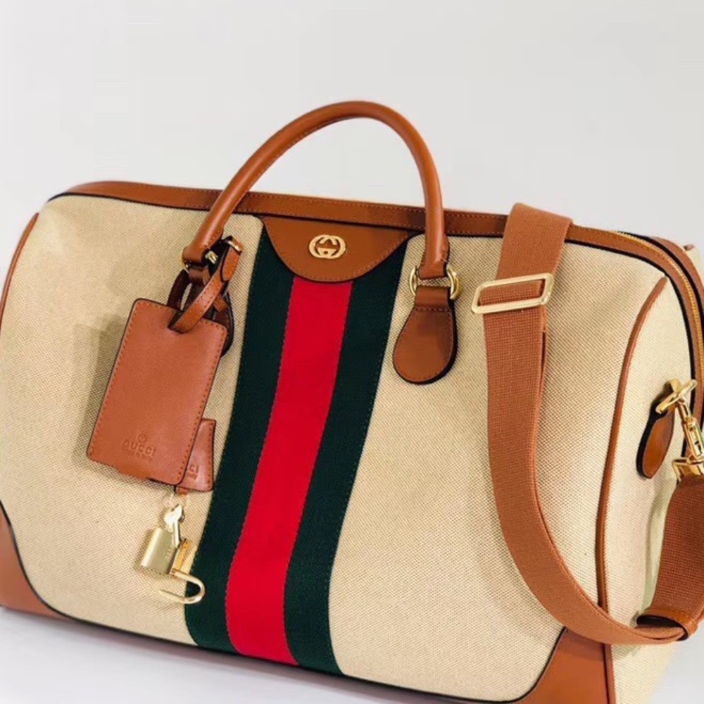 GUCCI Canvas Vintage Carry on brown bag.